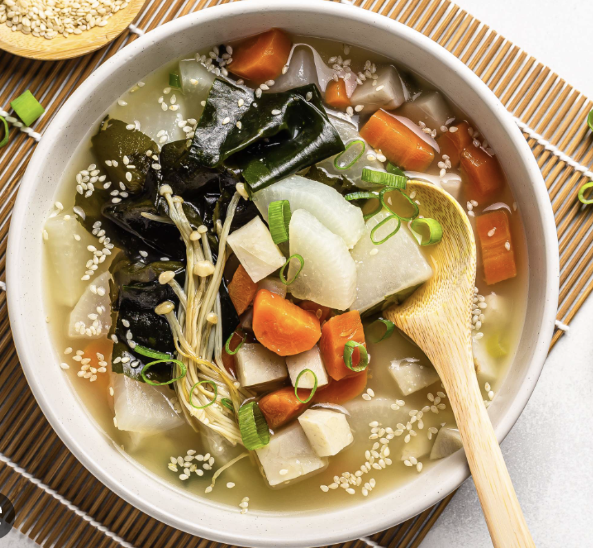 Bowl of miso soup with vegetables and tofu